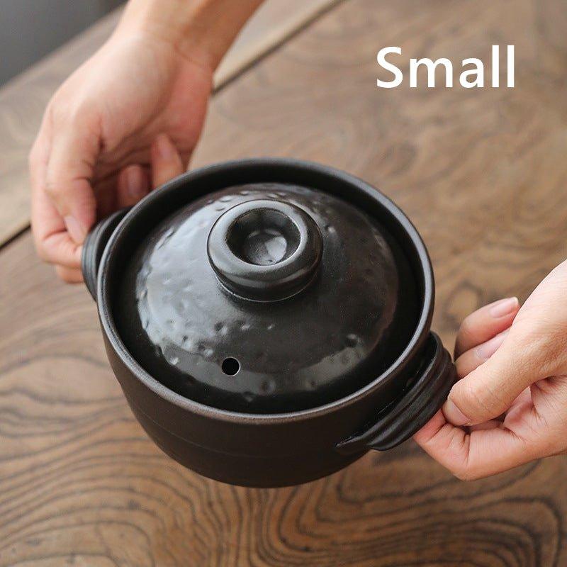 Small clay pot with a lid